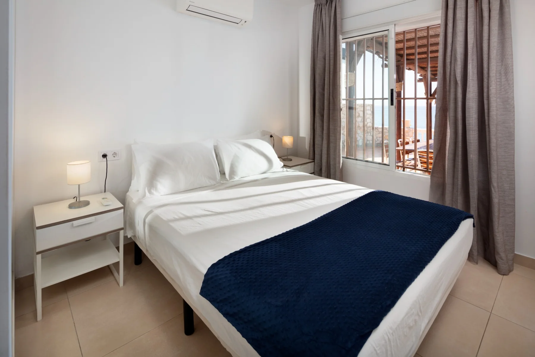 A comfortable bedroom at Casa Arena